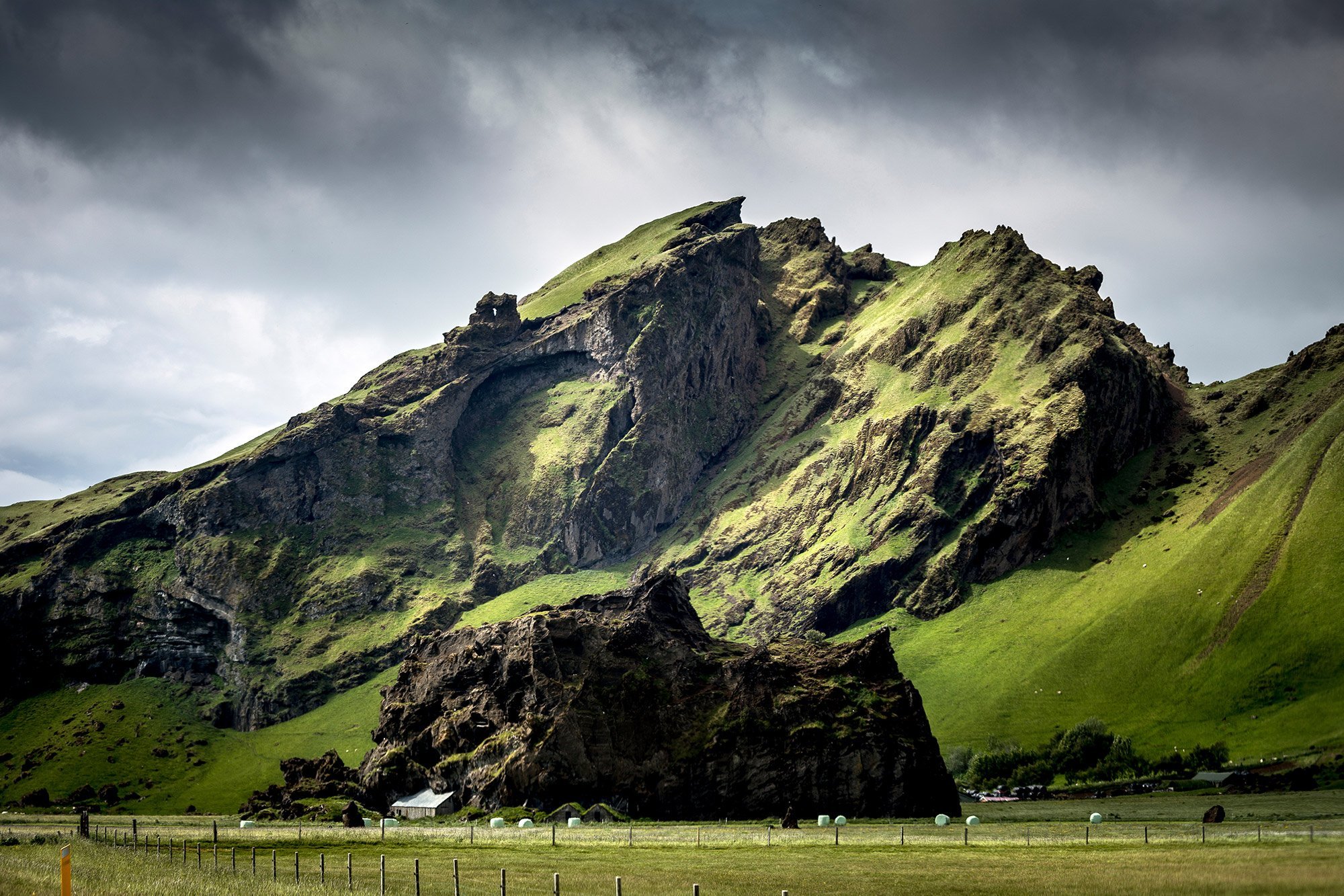 low-angle-shot-magnificent-grass-covered-mountains-captured-cloudy-day